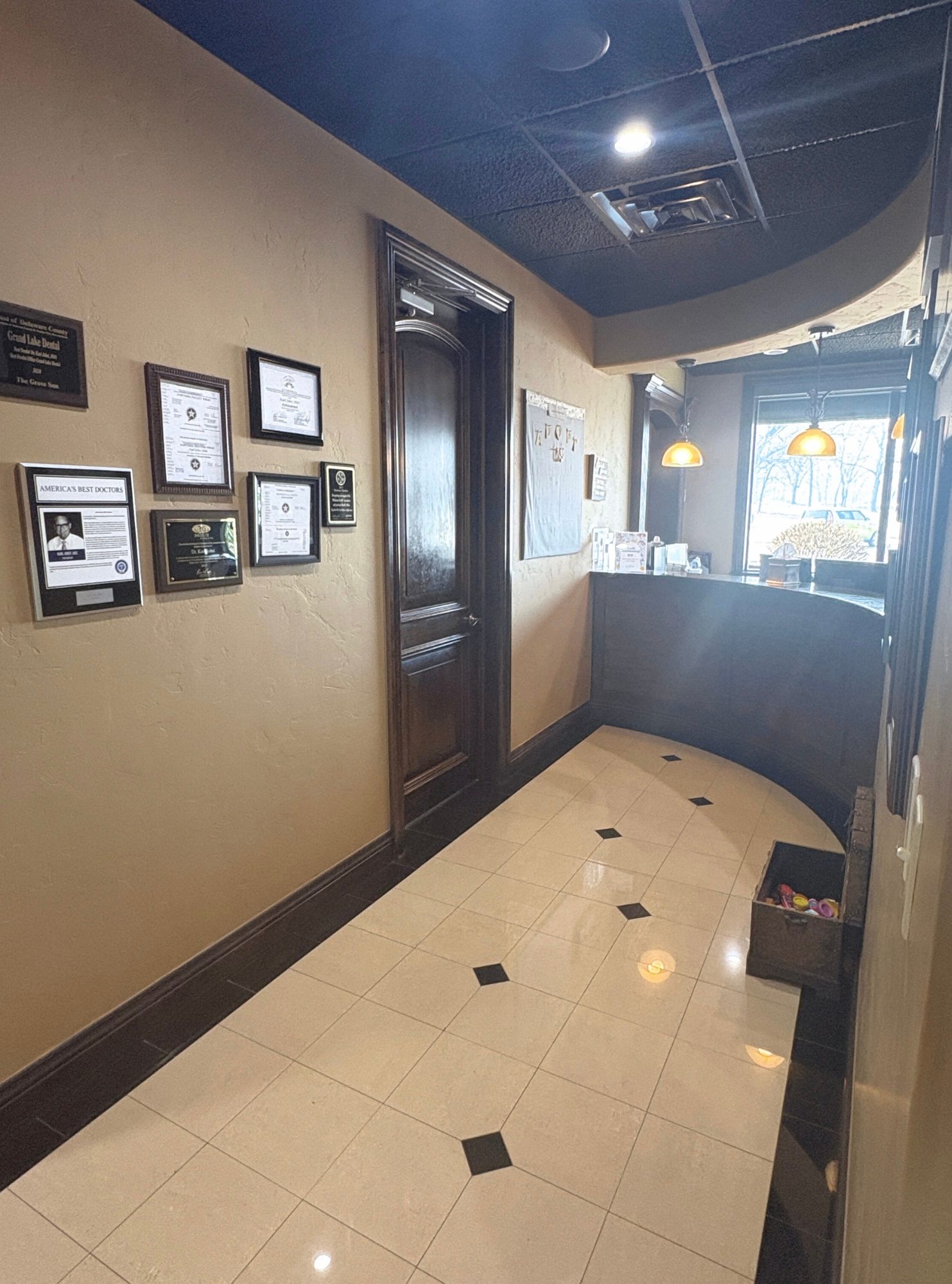 Front desk and wall of credentials